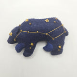 Blue constellation bear with gold stars on a white background