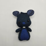 Blue plush toy mouse on a light gray background