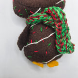 Chocolate Cake Penguin body 2 with icing and sprinkles and red and green scarf on a white background