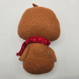 Brown gingerbread penguin back on a white background