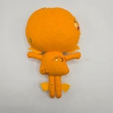 Orange Gillman that has orange features, sequins, and heart-shaped eyes, on a white background.