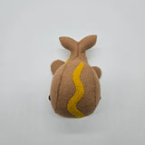 Handmade whale plush designed like a hot dog with mustard topping, soft brown food-themed whale stuffed animal on white background.